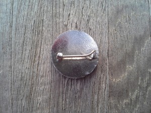 badge verso